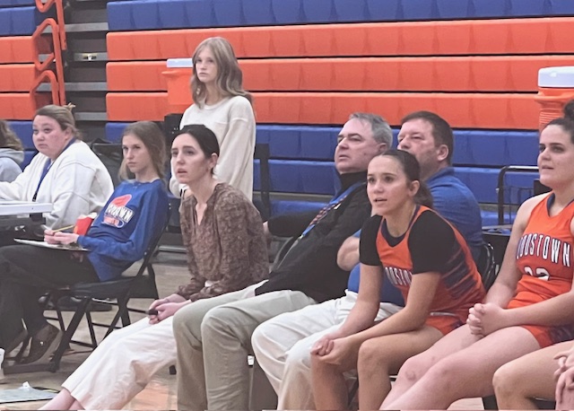 Straughn steps aside